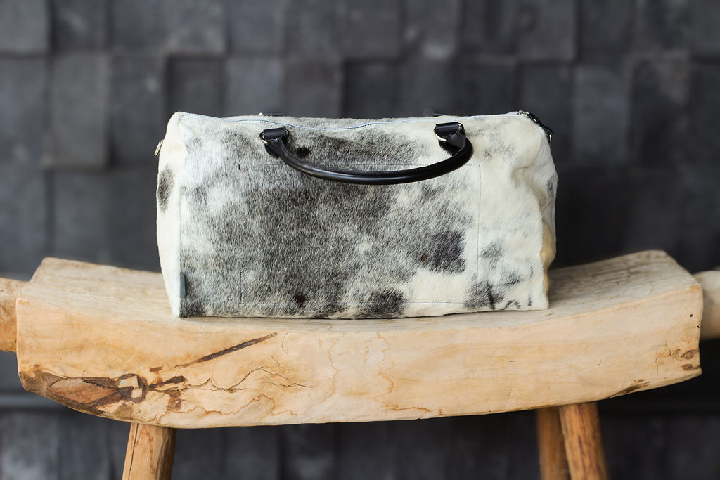Duffle — Pinto blanco y negro